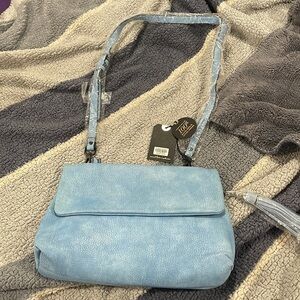 Light sky blue bag leather